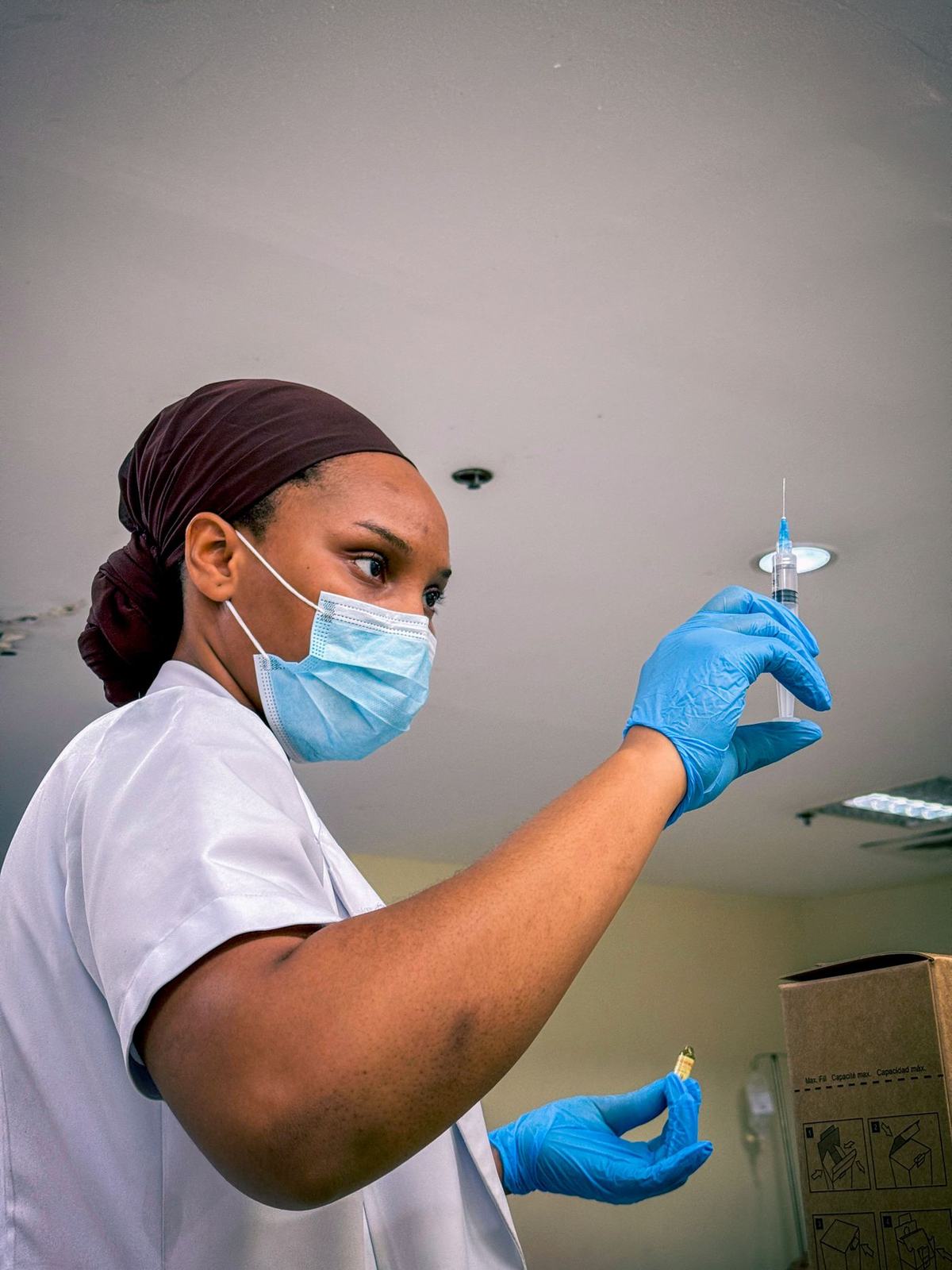 Dermatologist discussing treatment options with a patient